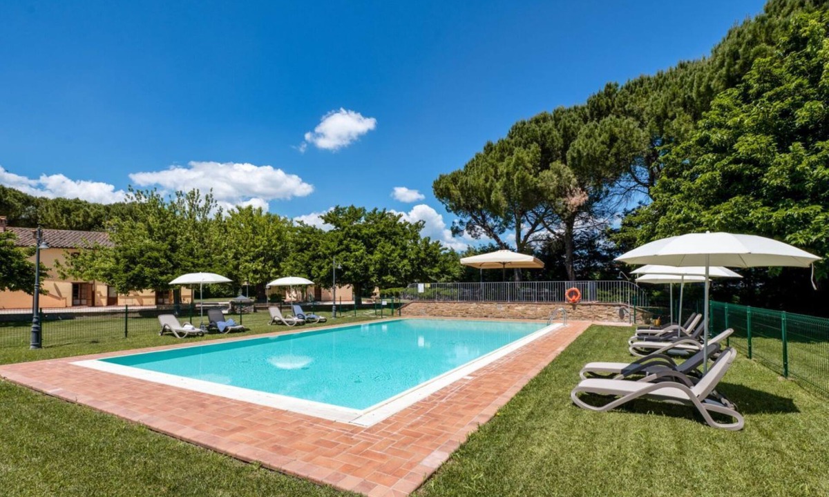 San Martino in Campo Apartment | A cozy 65 sq m apartment, located on the first floor of a building without an elevator, can accommodate up to 4 people.The property is located within a characteristic Umbrian-Tuscan farmhouse, featuring a large garden, relaxation areas, and a shared swim