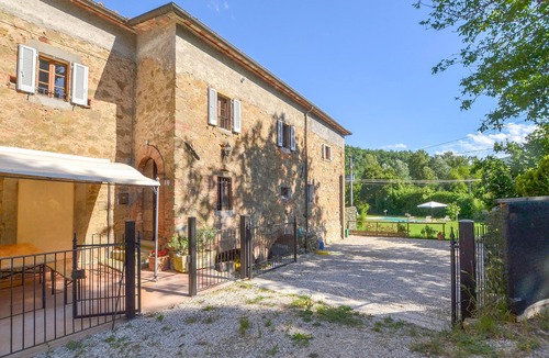 Bivio Lugnano House | An original cottage in an old mill with large fenced garden and private pool.