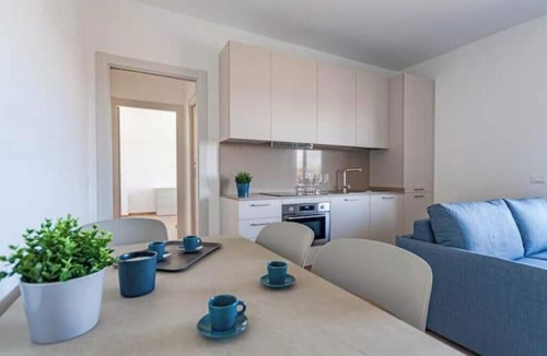Pisa Apartment | Balcony Tower View - Modern Apartment with Private Parking
