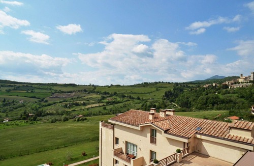 San Casciano dei Bagni Apartment | Beautiful apartment for 4 people with A/C, pool, WIFI, TV, terrace, panoramic view and parking