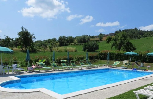 Caprese Michelangelo House | Homerez - Nice house for 2 ppl. with shared pool at Caprese Michelangelo