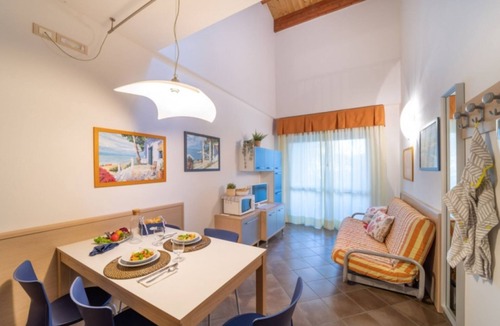 Bibione Pineda Apartment | Spacious apartment on two levels with pool