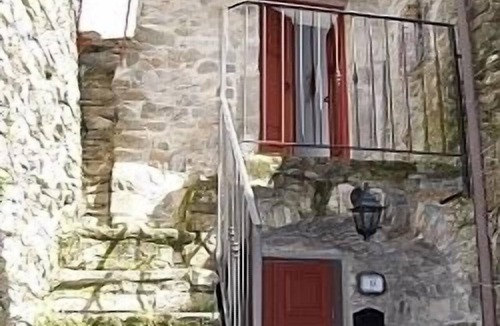 Tresana Villa | Traditional stone villa with terrace & gardens, in the hills of Lunigiana, Northern Tuscany.