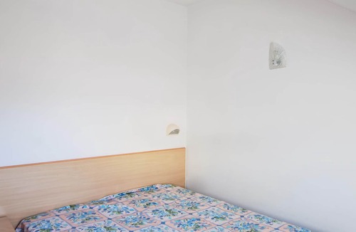 Campofilone Apartment | Your view of the beach, the sea and the palm trees ? here you have arrived on vacation!