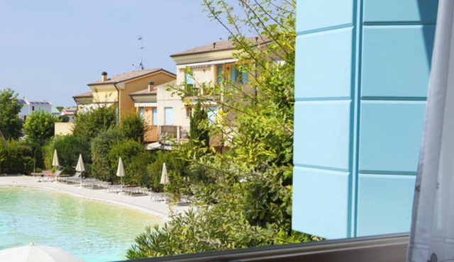 Apartment 'Residence Borgo Dei Fiori H06' with Shared Pool and Private Terrace