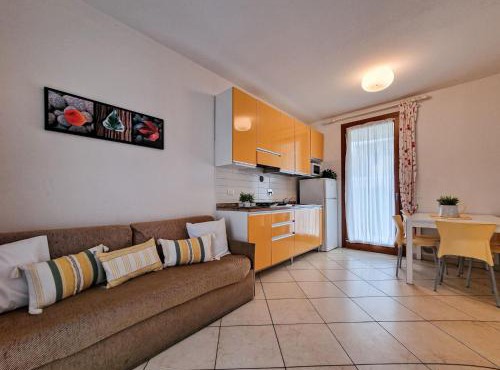 Holiday village apartment with pool and garden in Bibione
