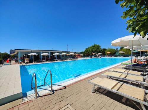 Long Beach Village Residence on the sea with private beach included in Lido Adriano