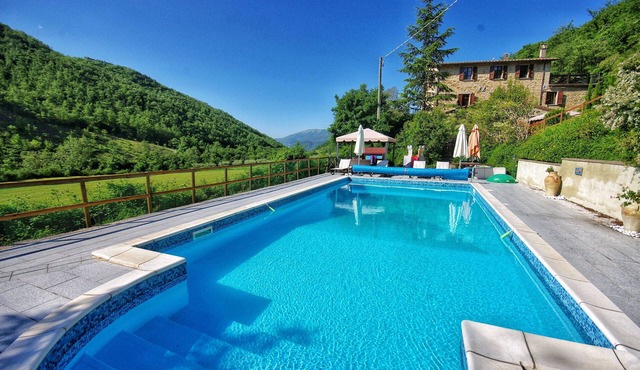 Pantano-Beautiful and Imposing Stone Farmhouse with Pool in Quiet Valley Setting in Pierantonio