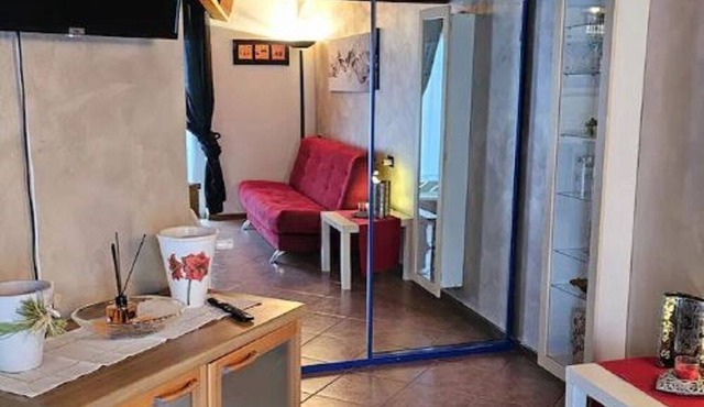 Apartment 'Mansarda Comano Terme' with Mountain View and Balcony in Comano Terme